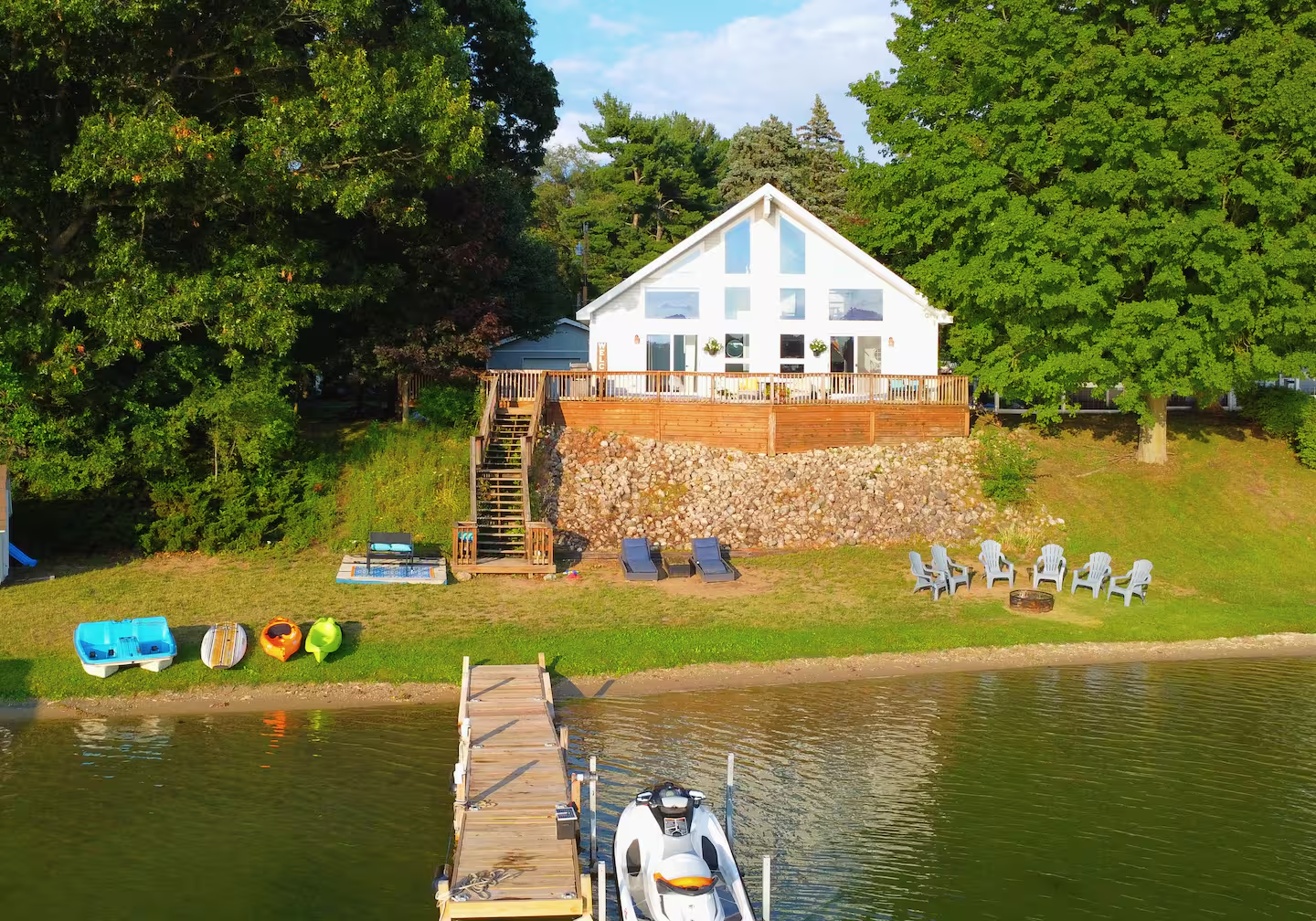 Private beach, dock, kayaks and jet ski at the water's edge